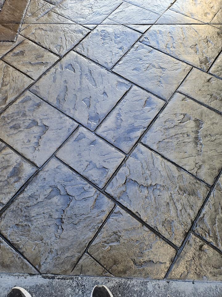 Close-up herringbone stamped concrete detail