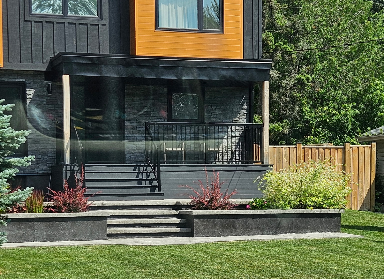 Completed stamped stairs and patio on modern home, summer