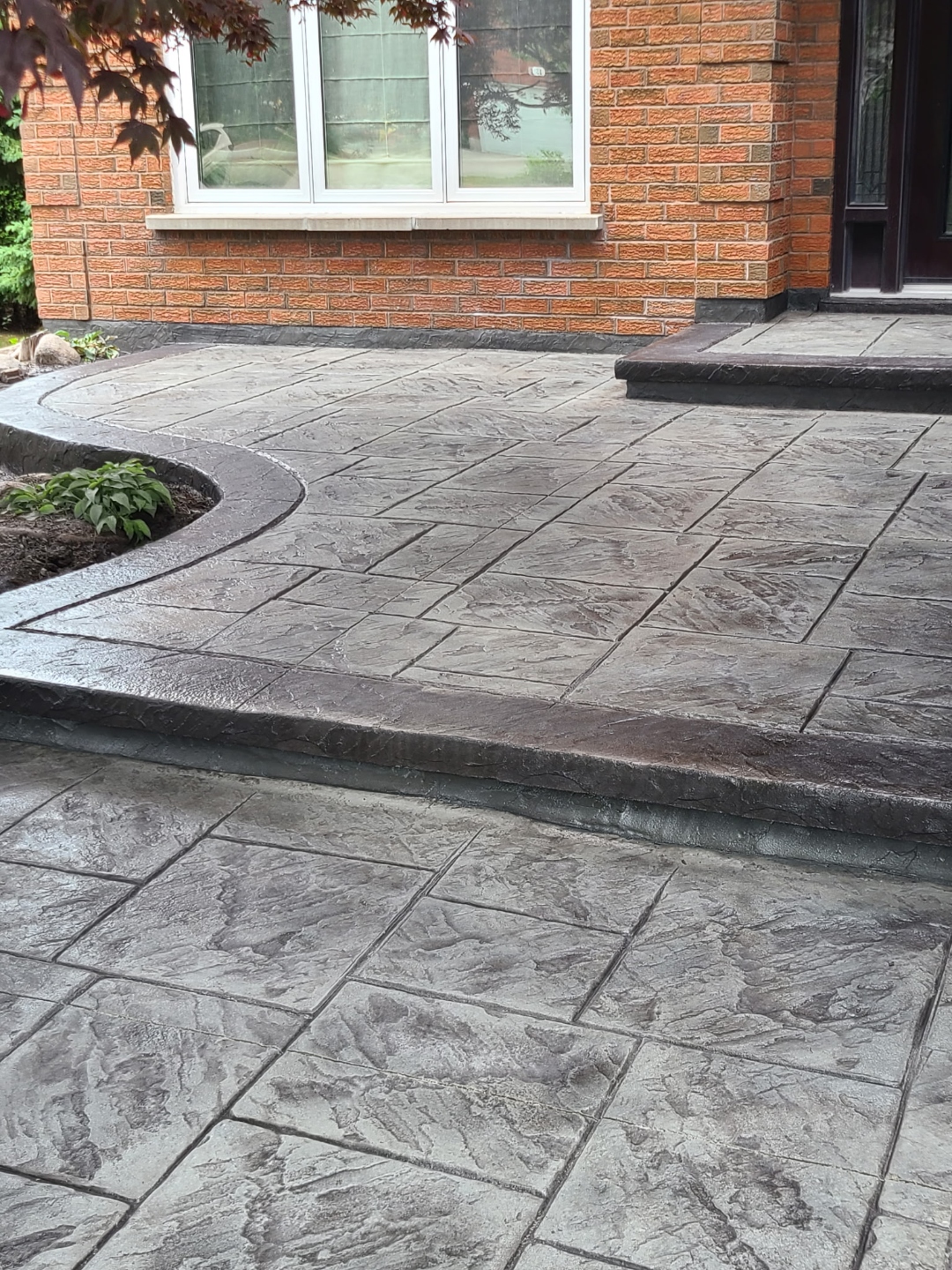 Stamped concrete front walkway and steps