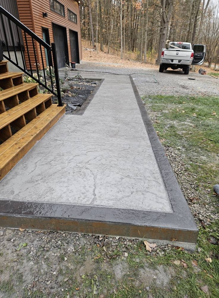 Stamped concrete walkway at cottage property