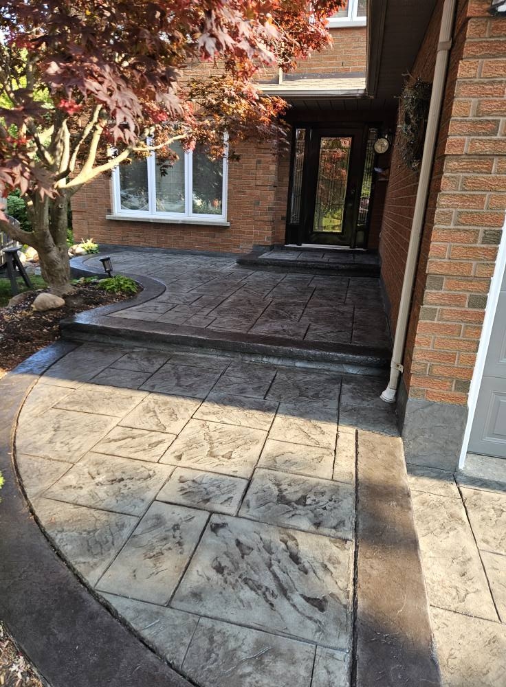 Stamped concrete walkway and front entrance steps